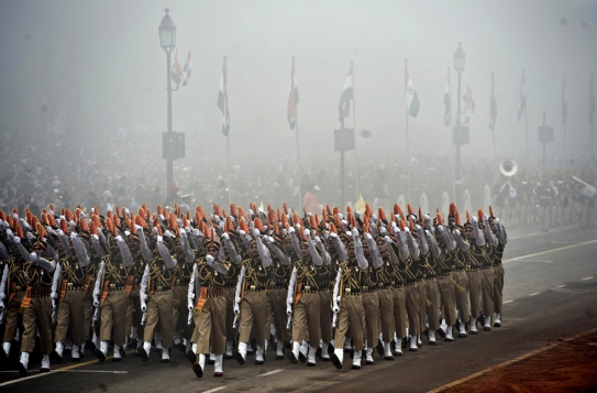 Indian soldiers march during the Indian Republic Day parade in New Delhi on January 26, 2010. Blanket fog obscured the start of India's 60th Republic Day celebrations, with the annual military parade in New Delhi held under heightened security due to fears of militant attacks. AFP PHOTO/PEDRO UGARTE (Photo credit should read PEDRO UGARTE/AFP/Getty Images)